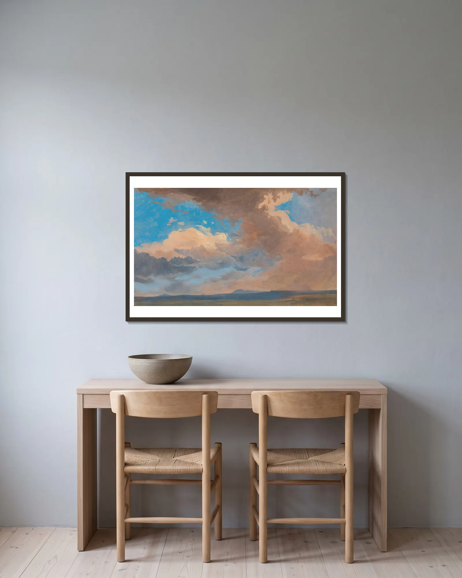 Wolkenstudie av Adalbert Stifter inramad på en vägg