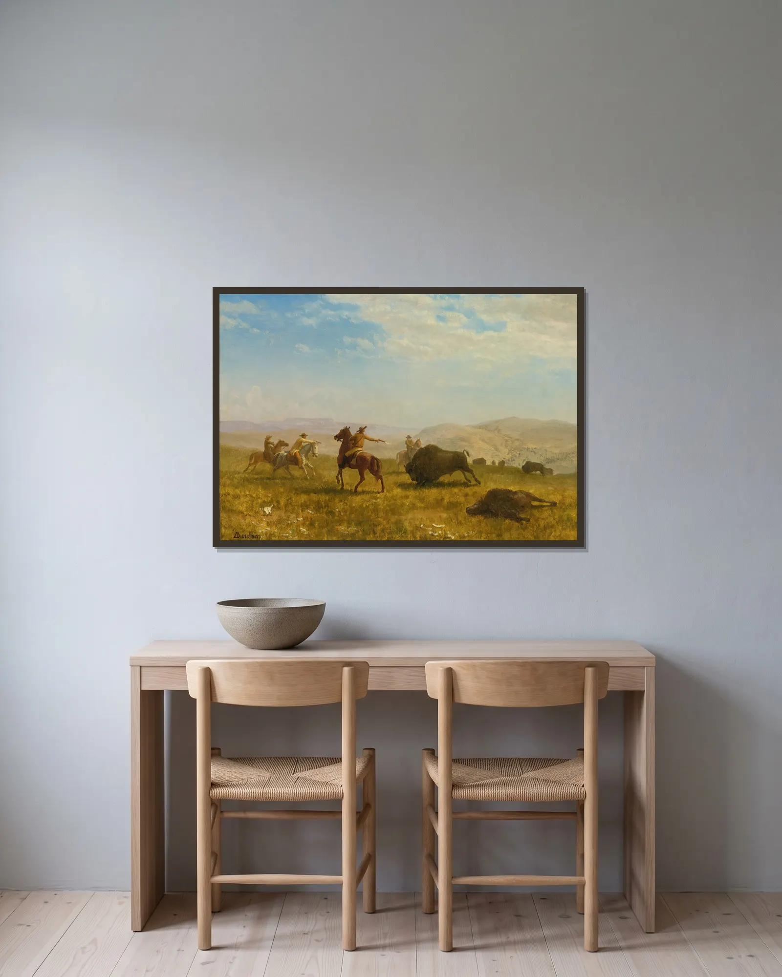 The Wild West av Albert Bierstadt inramad på en vägg