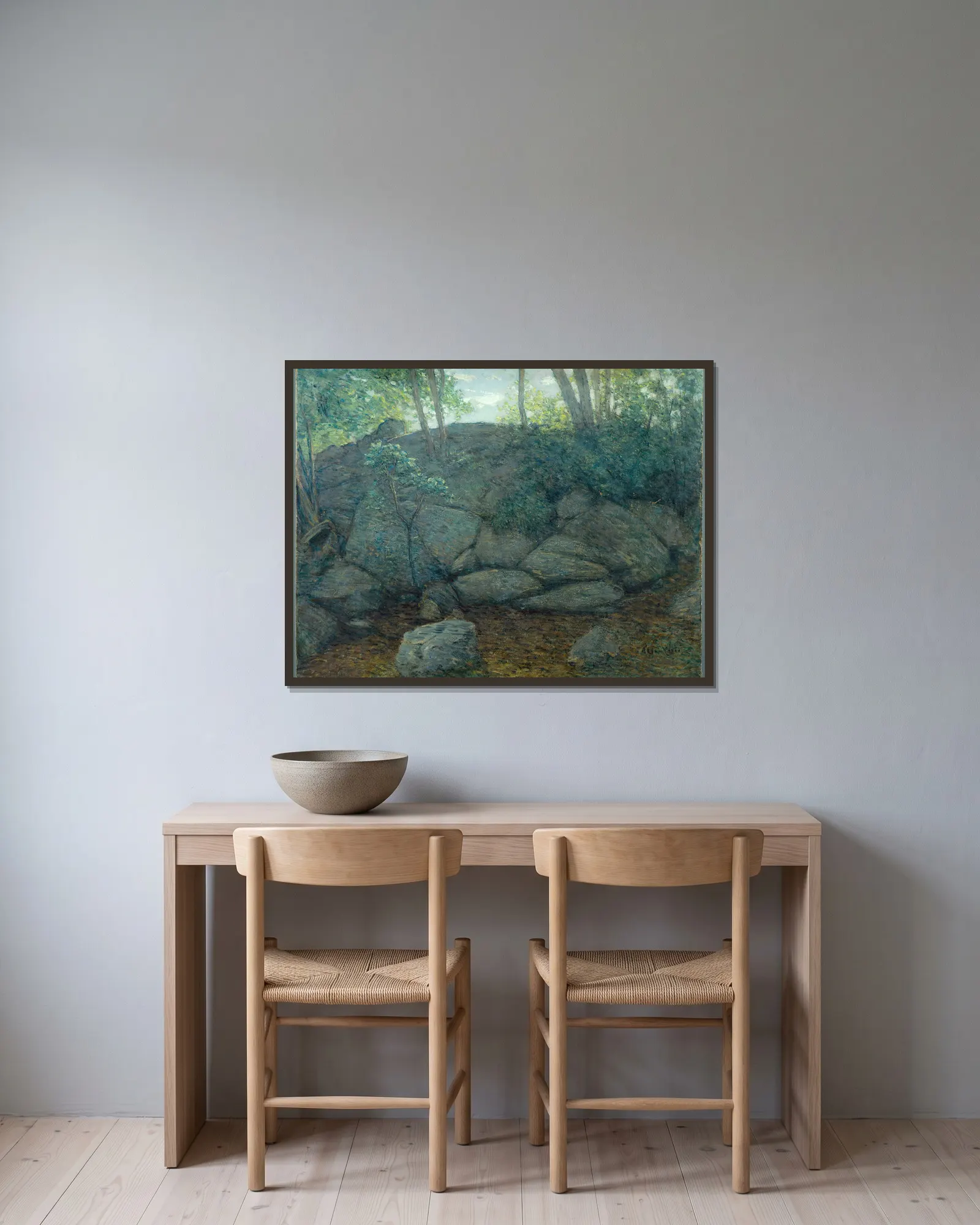 Woodland Rocks av Julian Alden Weir inramad på en vägg