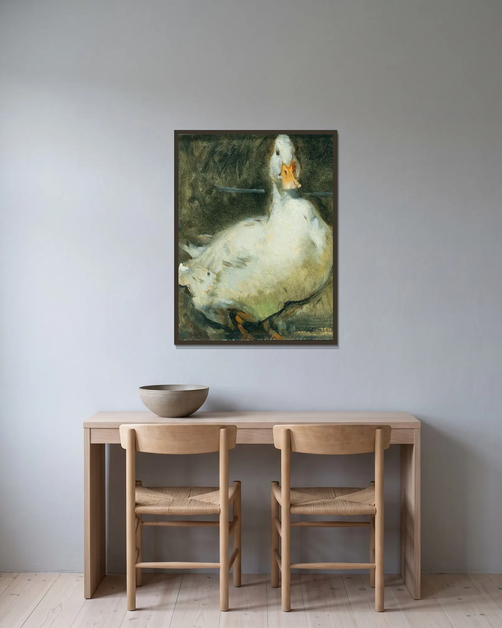 Duck av Alexander Koester inramad på en vägg