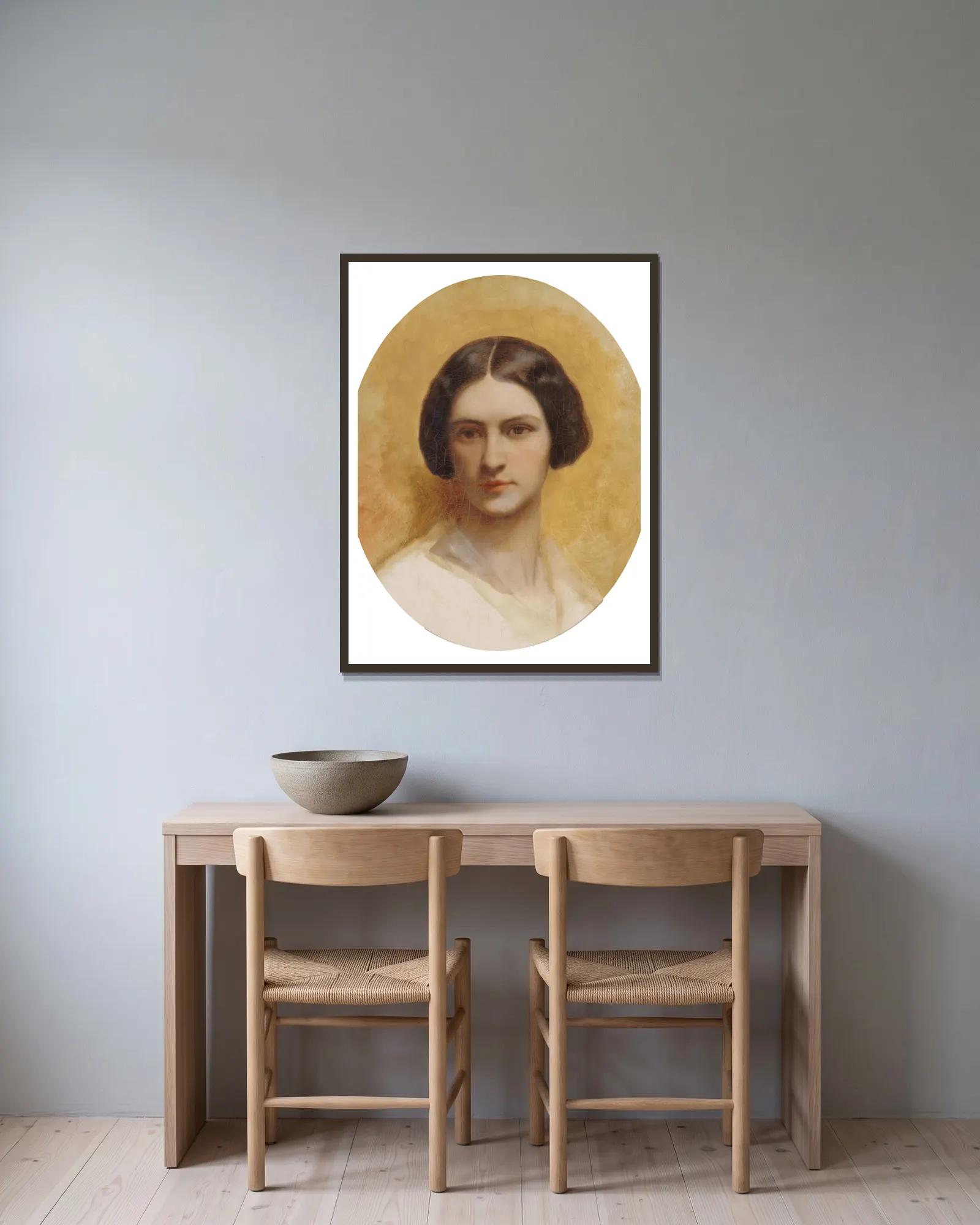 Portrait de Cornélia Marjolin-Scheffer av Ary Scheffer inramad på en vägg