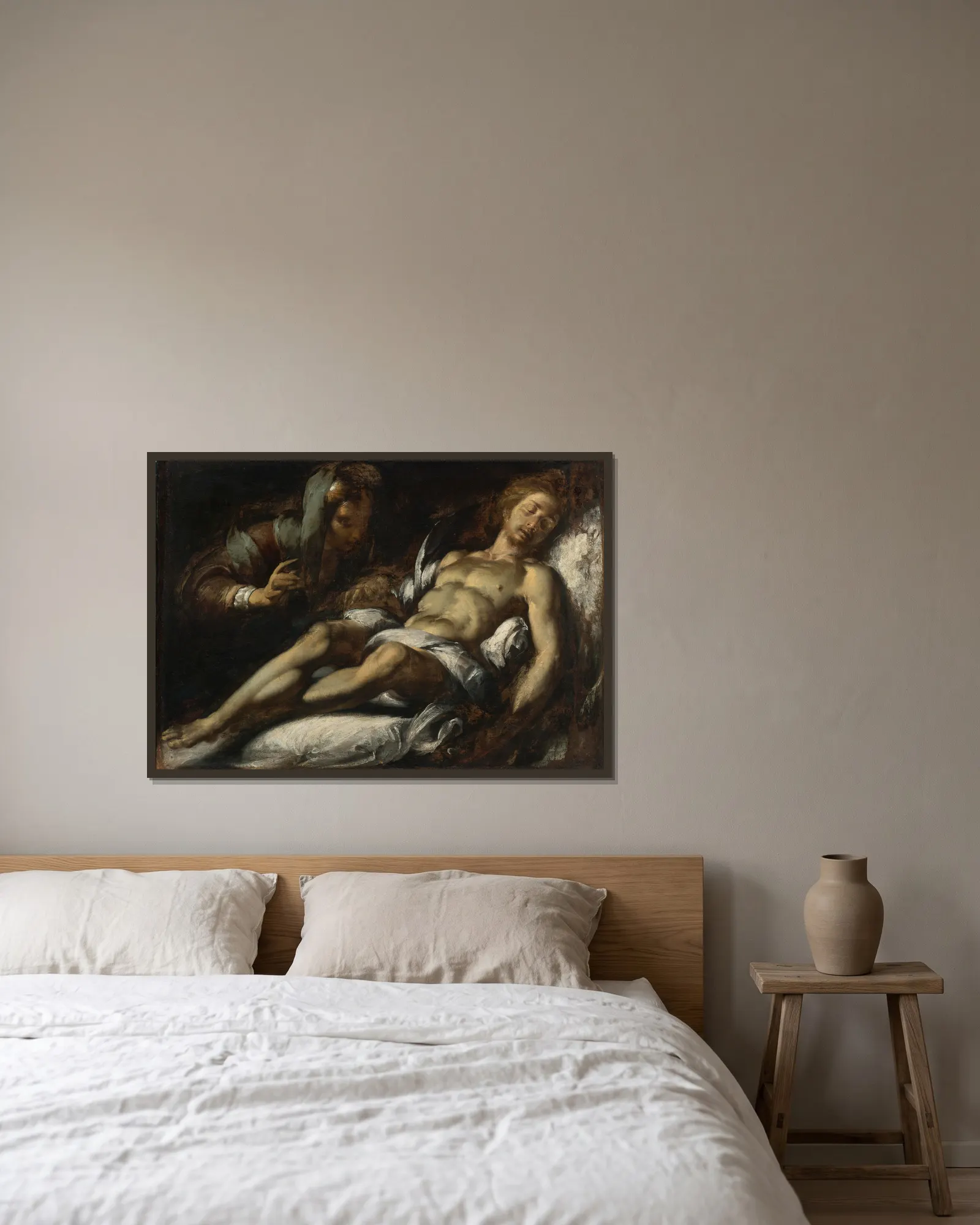 Pietá av Bernardo Strozzi inramad på en vägg