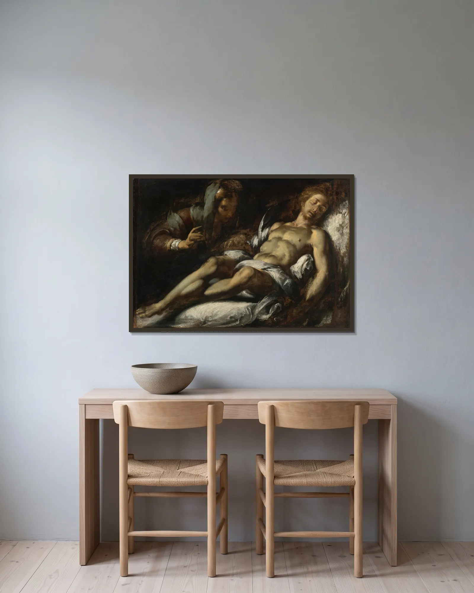 Pietá av Bernardo Strozzi inramad på en vägg