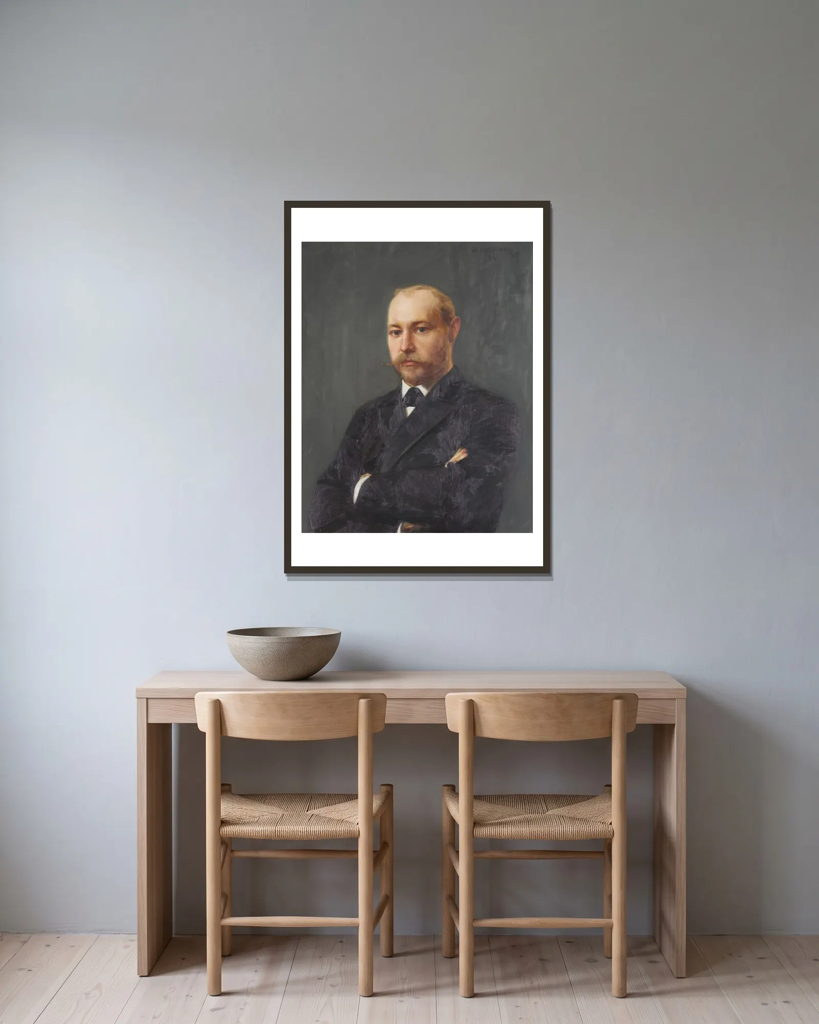 Portrait of John Jäderström (1861-1918) av Bernhard Österman inramad på en vägg