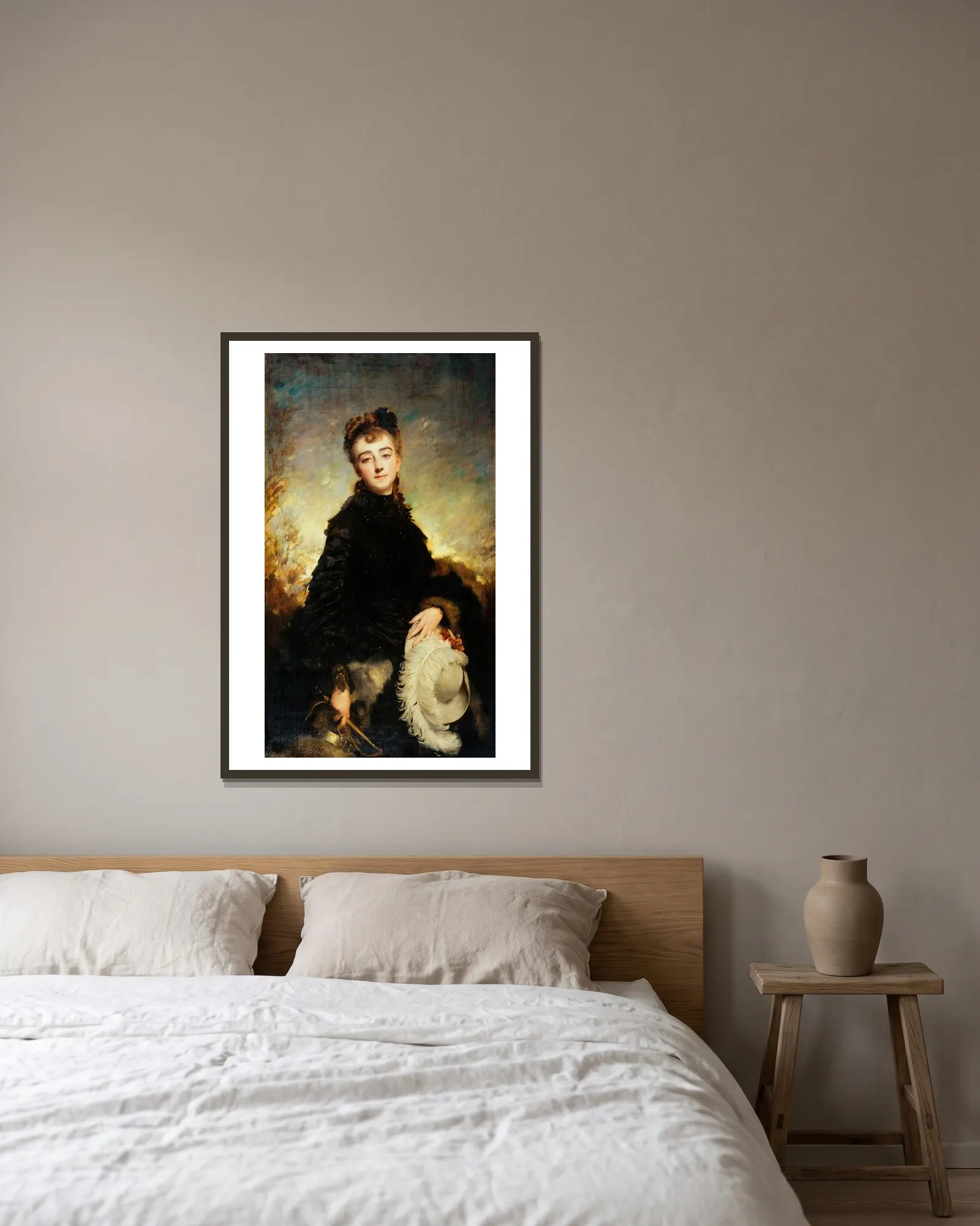 Portrait de femme av Charles Chaplin inramad på en vägg