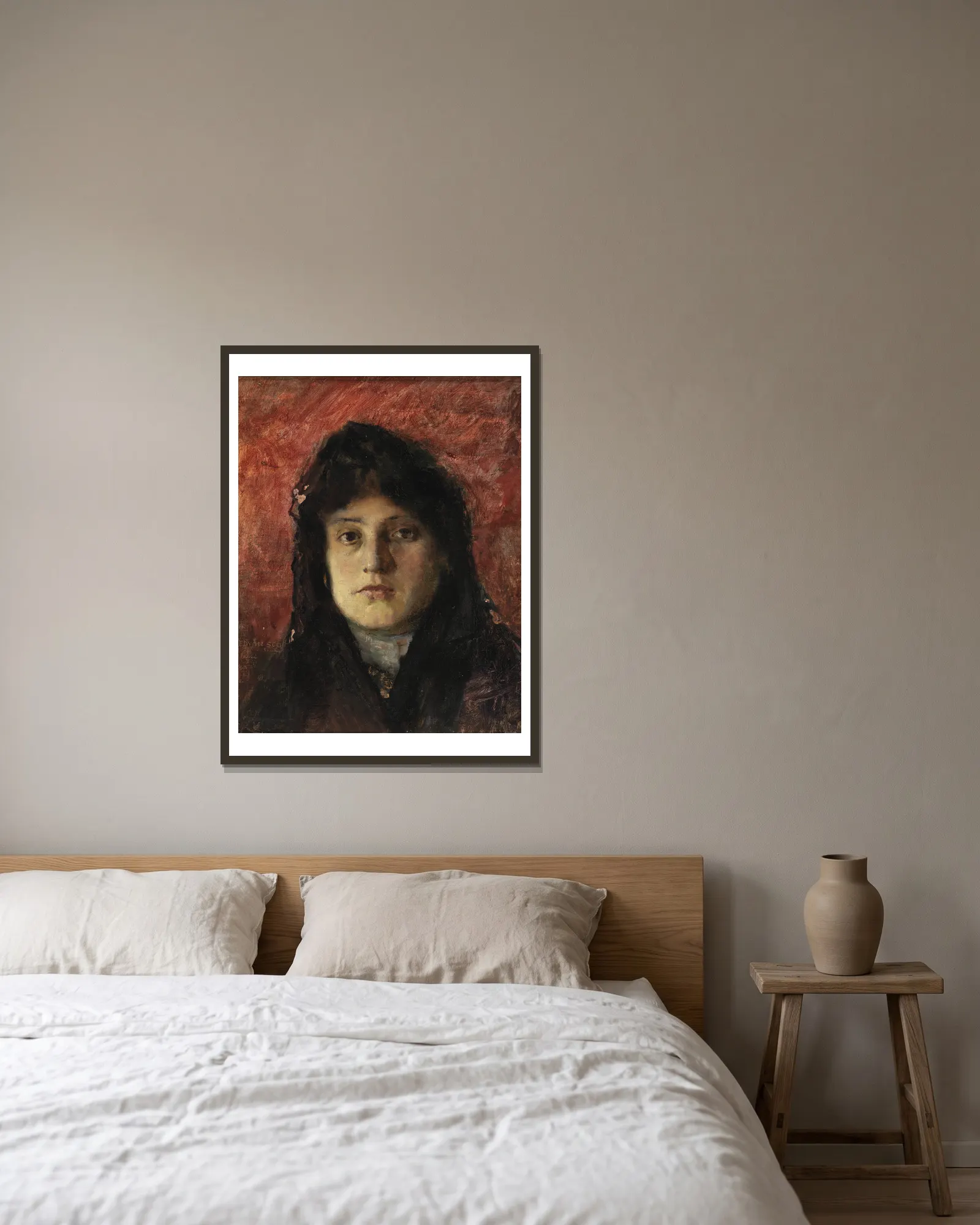 Tete de Femme av Frank Edwin Scott inramad på en vägg