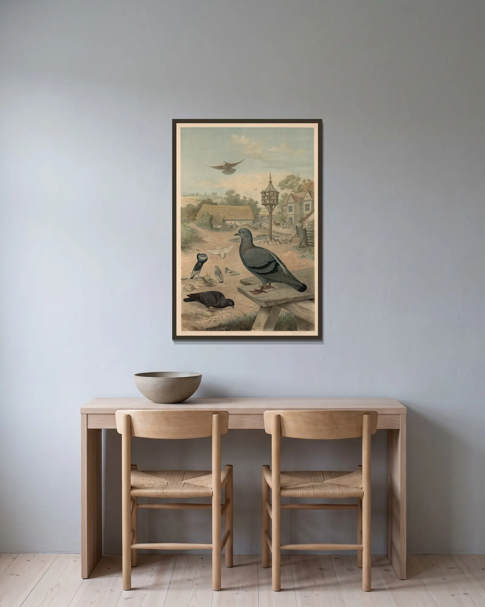 Pigeons av Emil Schmidt inramad på en vägg