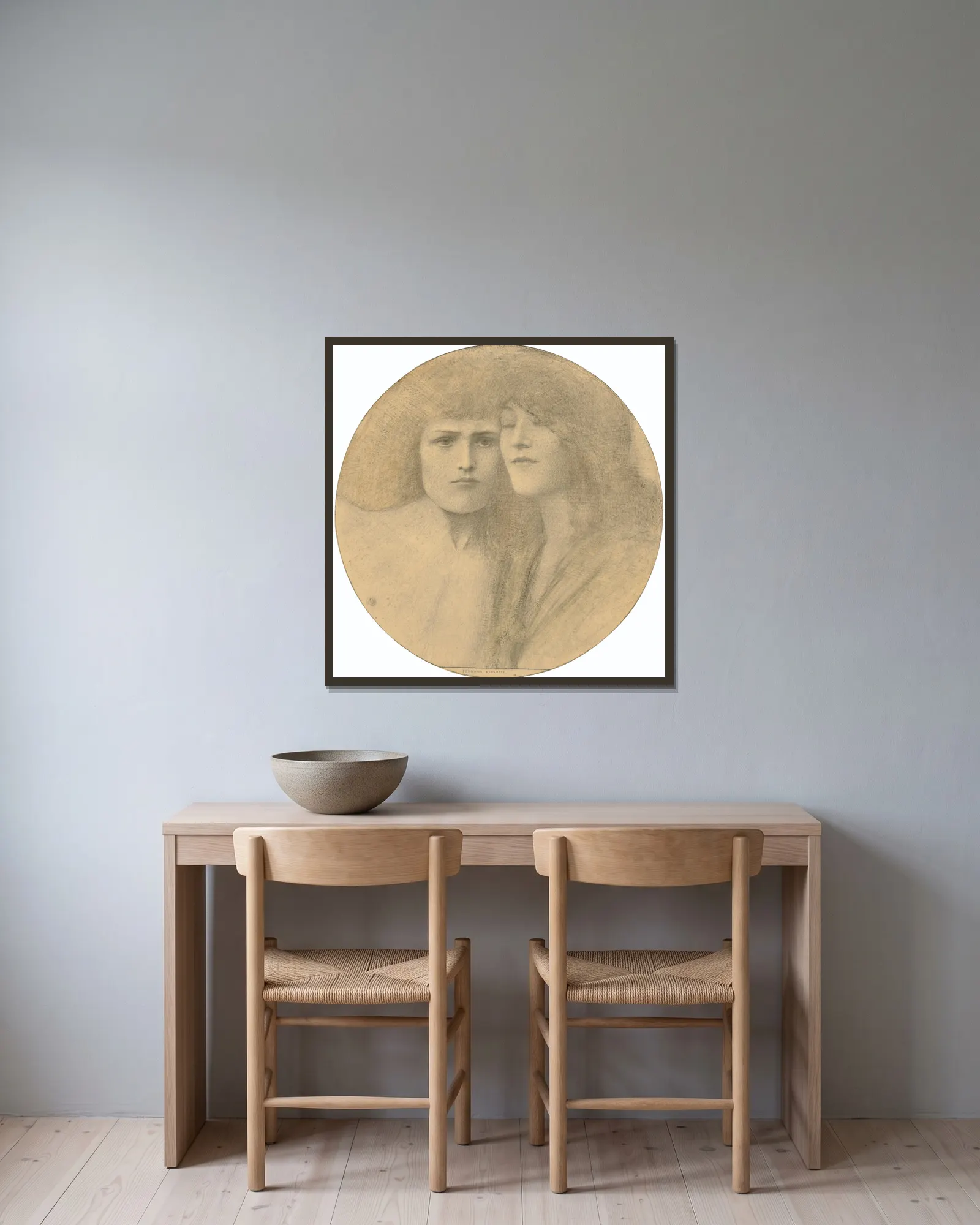 Les Caresses av Fernand Khnopff inramad på en vägg