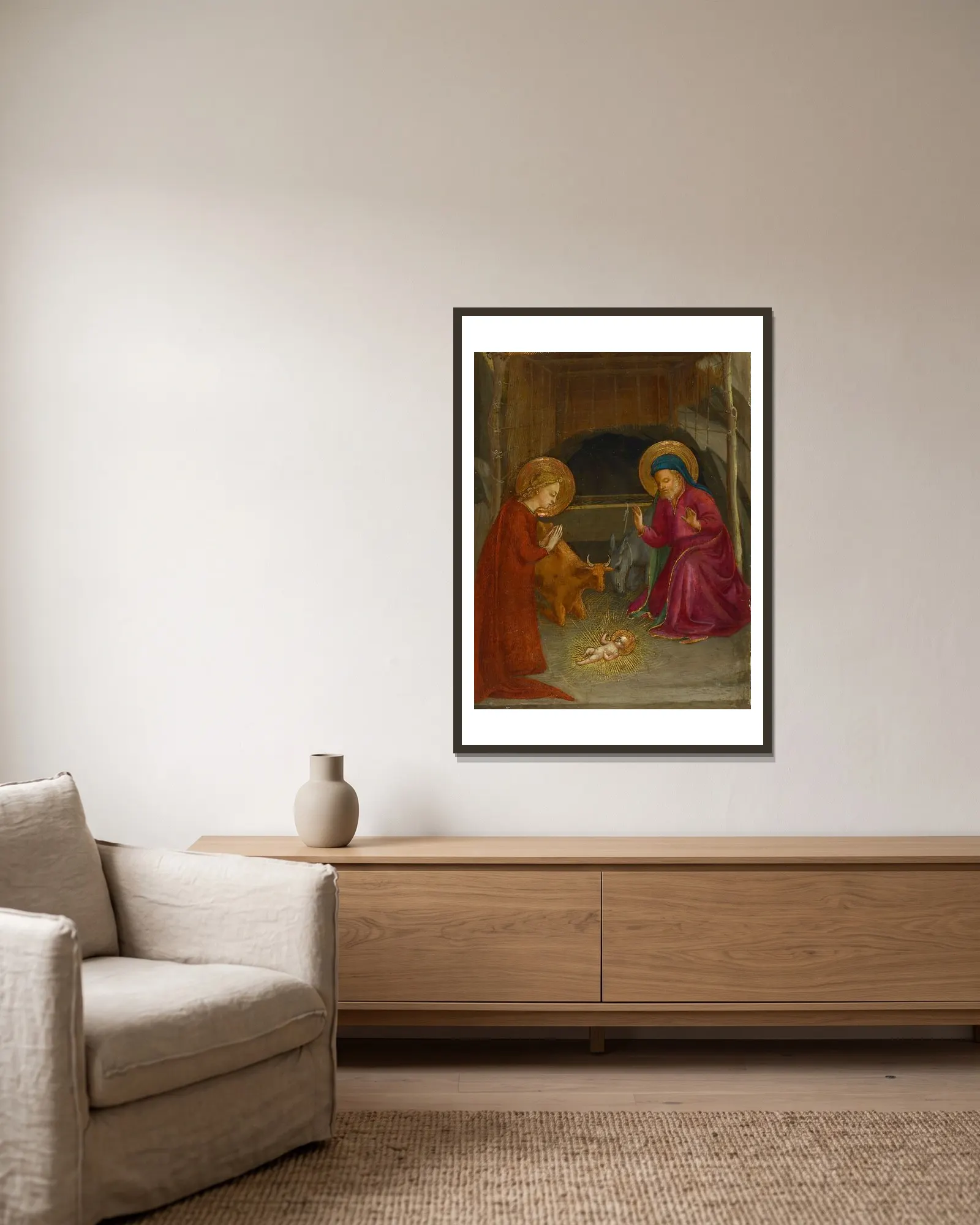 The Nativity av Fra Angelico inramad på en vägg