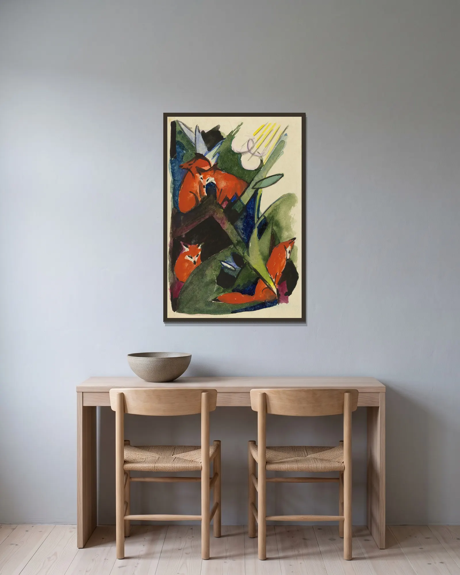Four foxes av Franz Marc inramad på en vägg