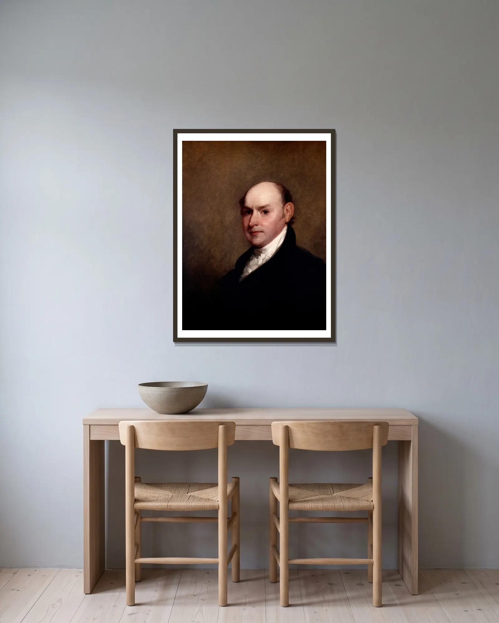 John Quincy Adams av Gilbert Stuart inramad på en vägg