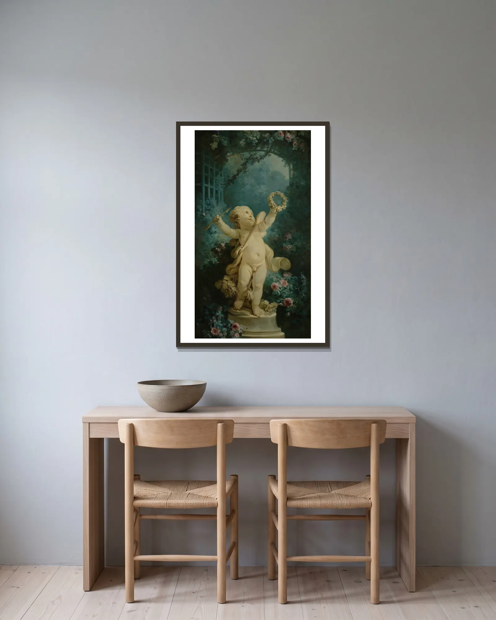 L’Amour triomphant av Jean-Honoré Fragonard inramad på en vägg