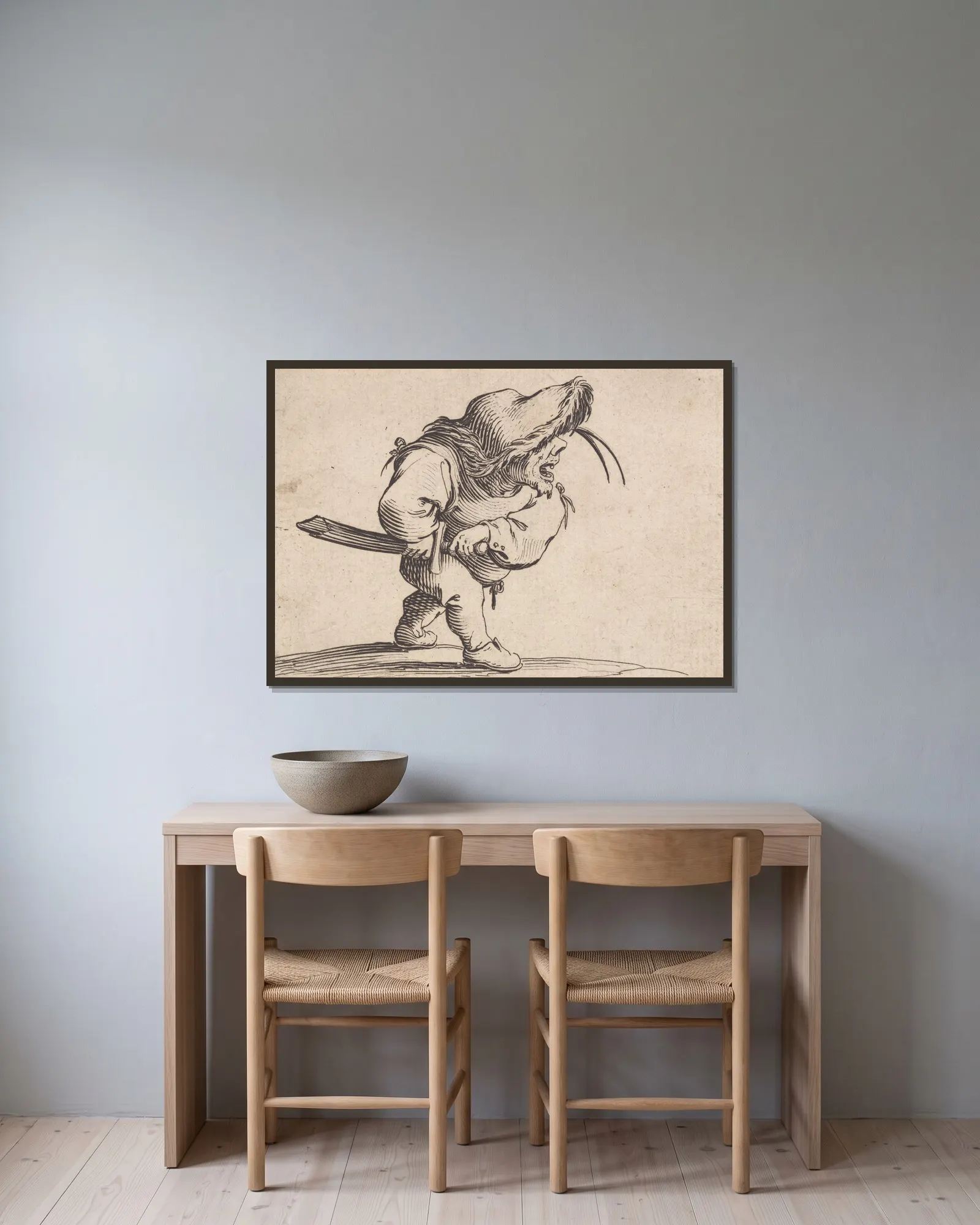L’homme s’apprêtant a tirer son sabre av Jacques Callot inramad på en vägg
