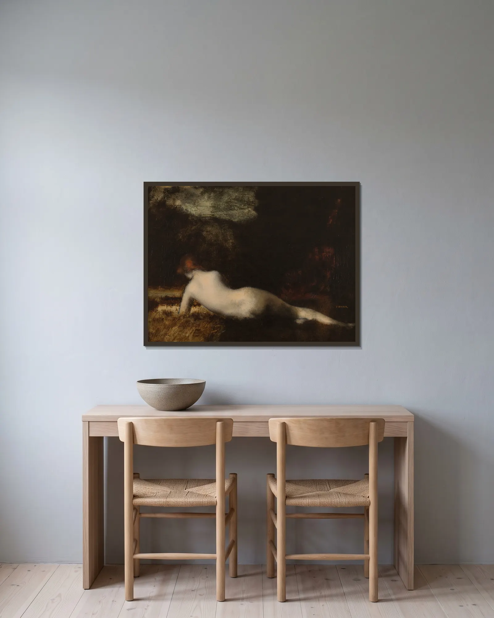 Nymphe couchée av Jean-Jacques Henner inramad på en vägg