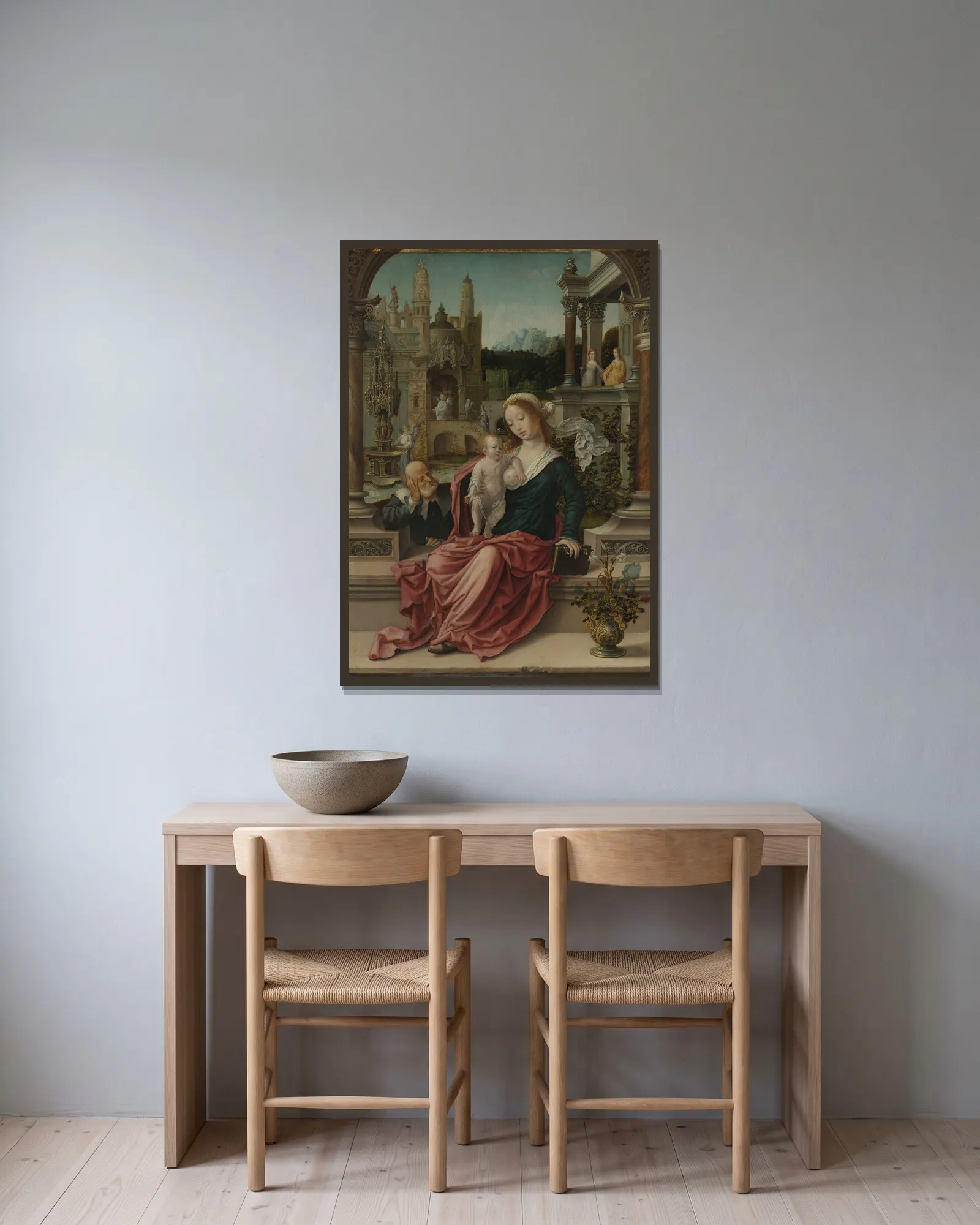 The Holy Family av Jan Gossaert inramad på en vägg
