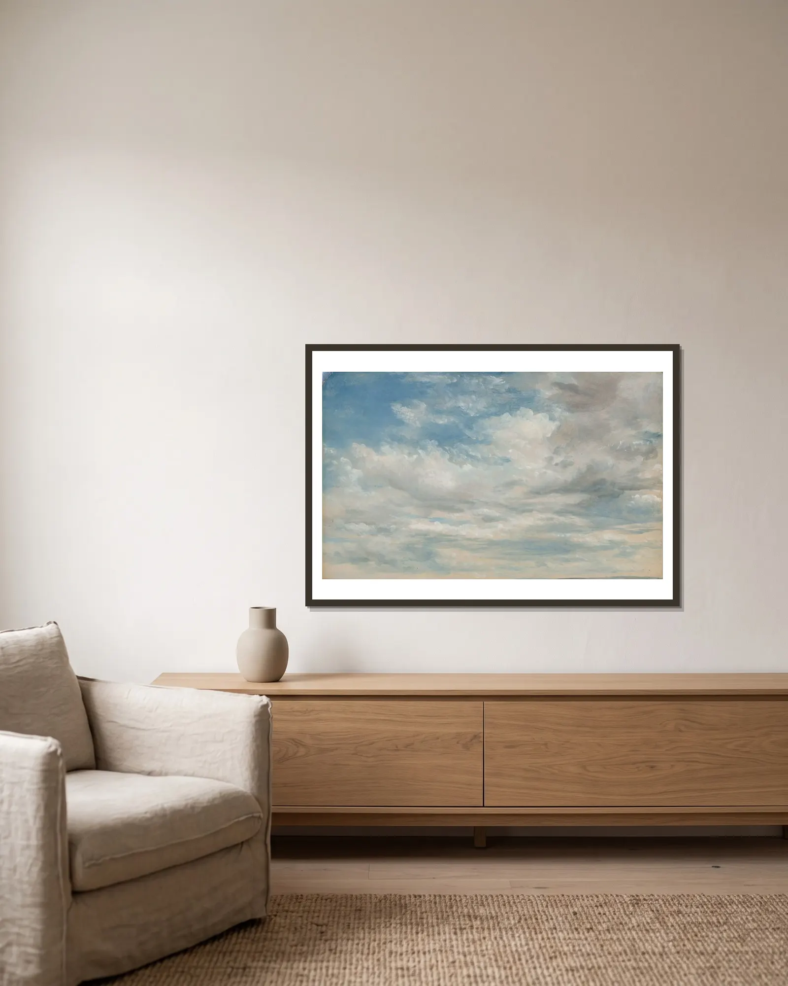 Clouds av John Constable inramad på en vägg
