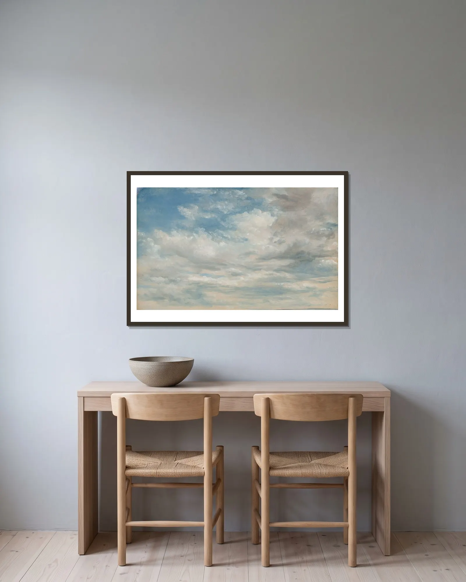 Clouds av John Constable inramad på en vägg