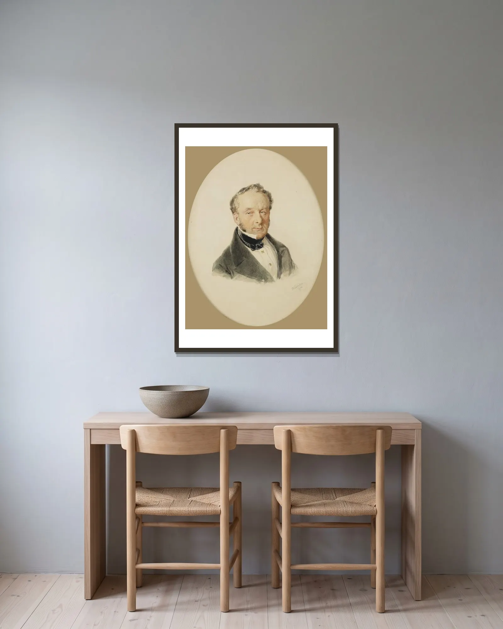 Herrenportrait av Josef Kriehuber inramad på en vägg