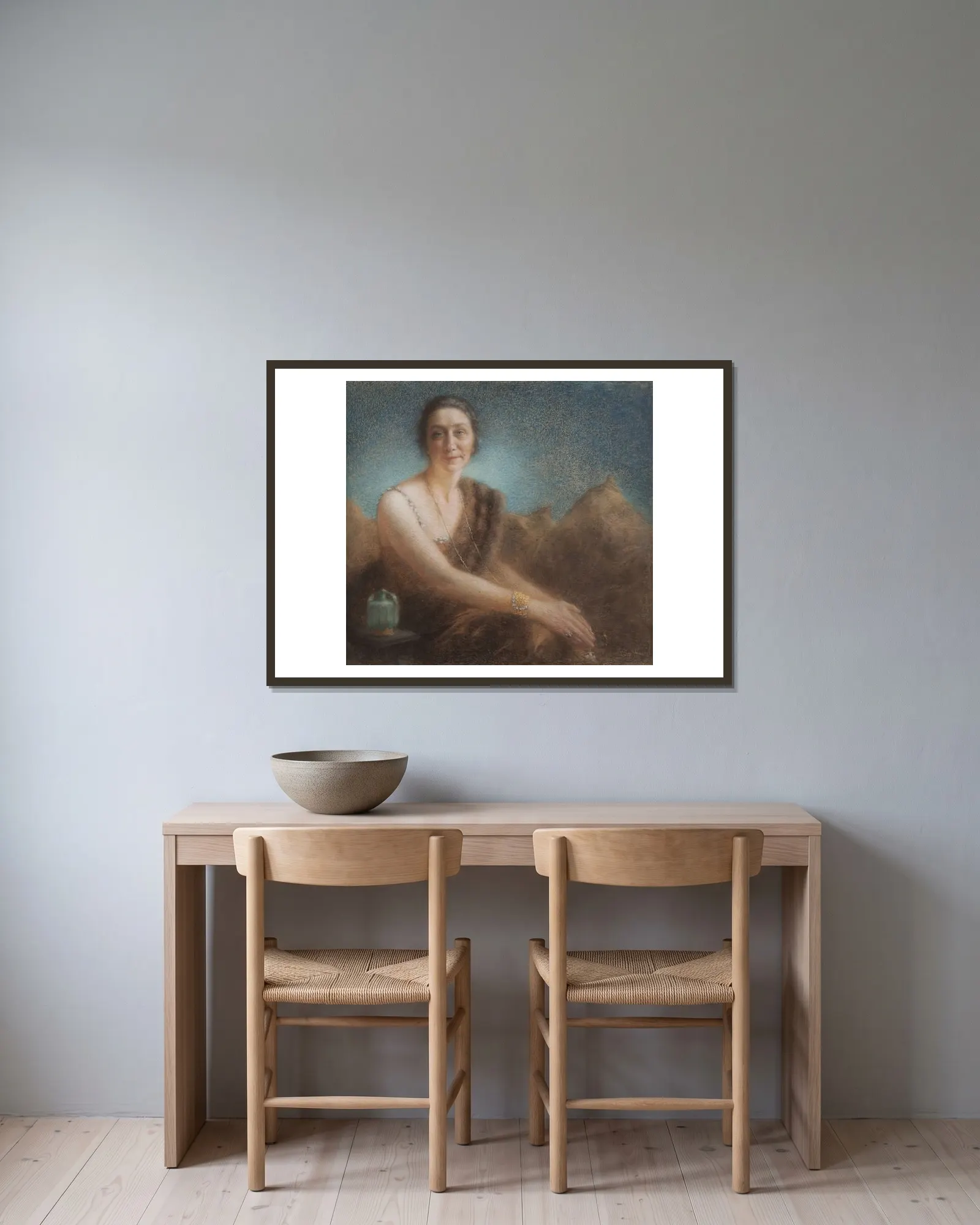 Elegant woman on a sofa av Lucien Lévy-Dhurmer inramad på en vägg