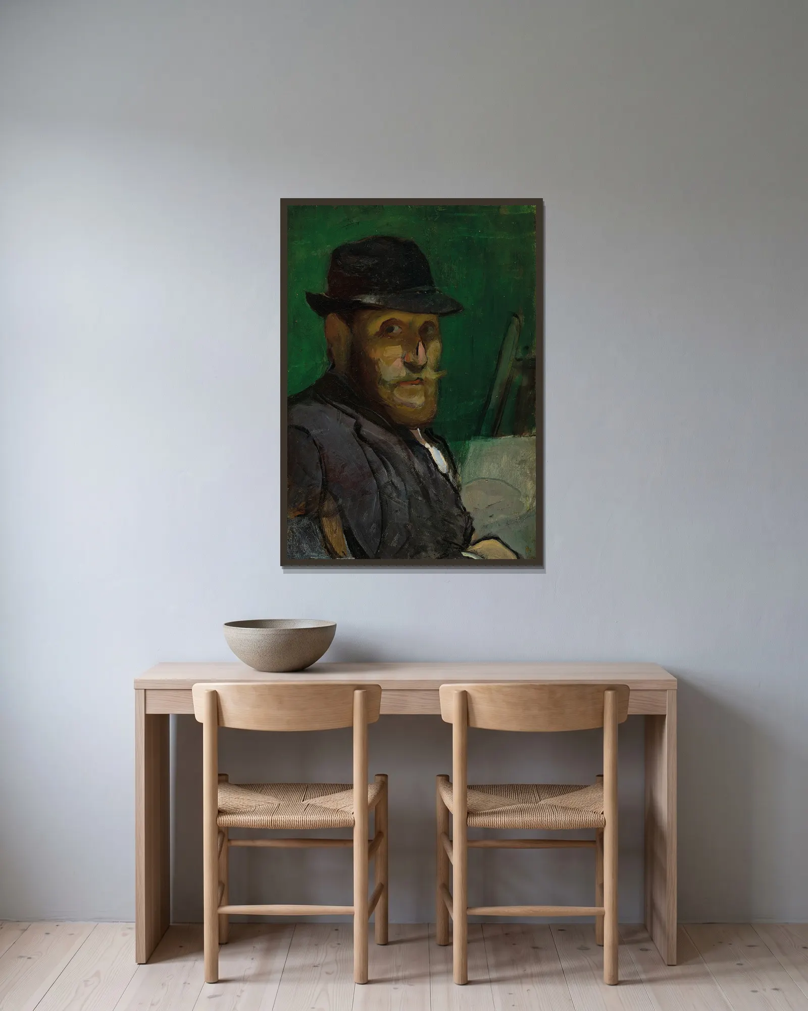 Autoportrait au chevalet av Louis Anquetin inramad på en vägg