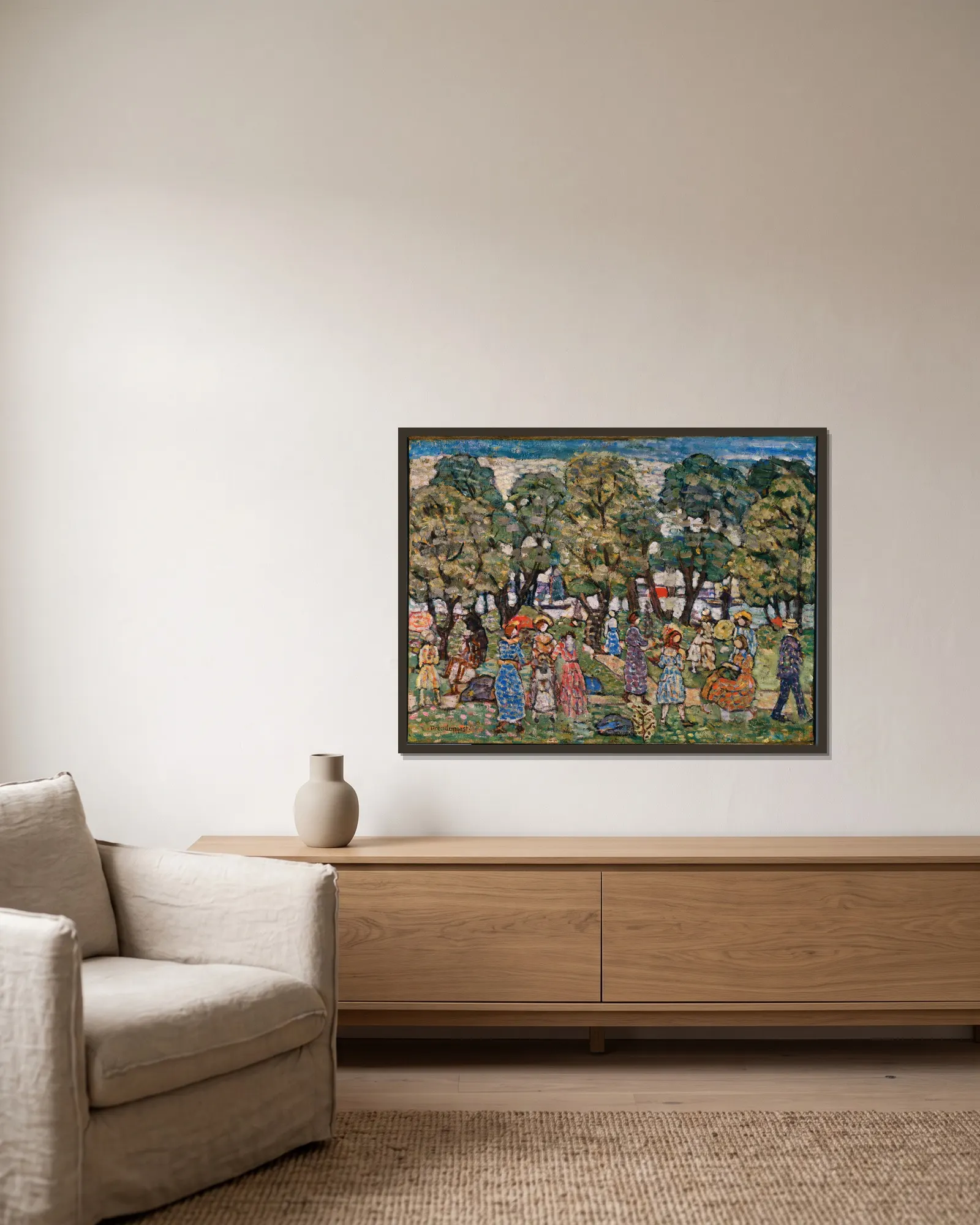 Under the Trees av Maurice Prendergast inramad på en vägg