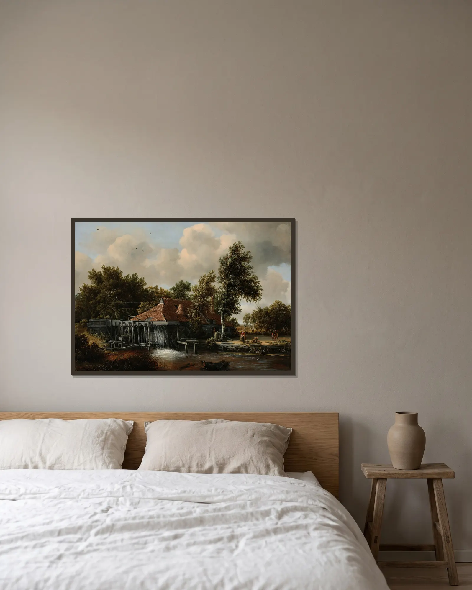 A Watermill av Meindert Hobbema inramad på en vägg