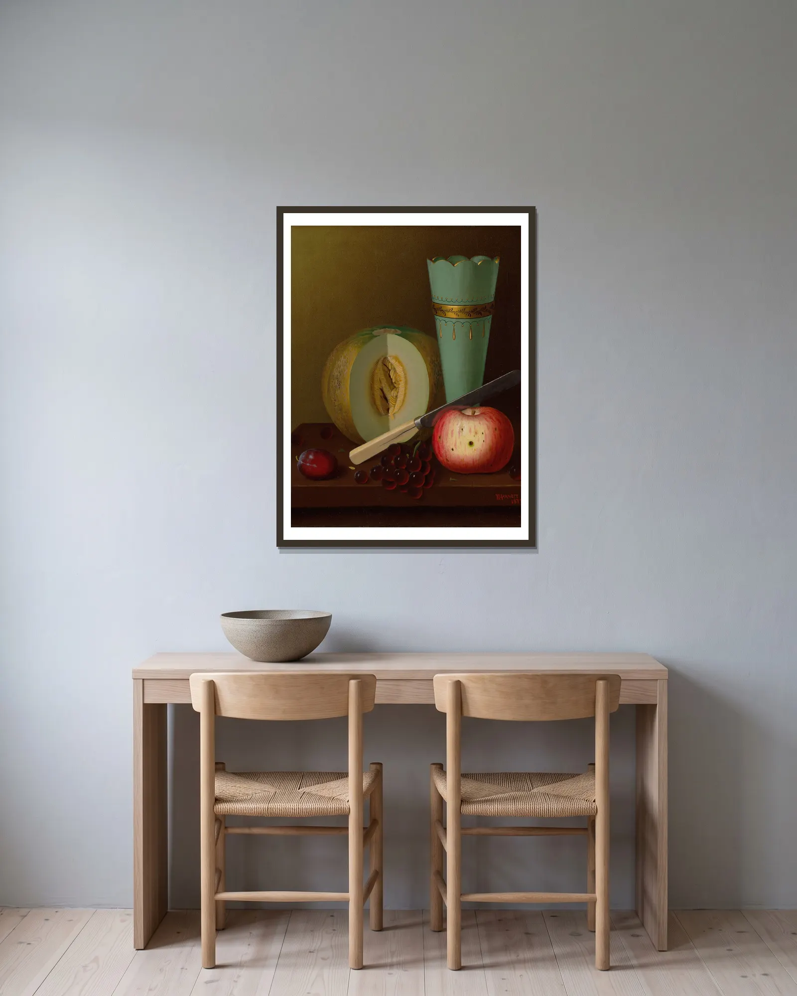Fruit Pieces av William Michael Harnett inramad på en vägg