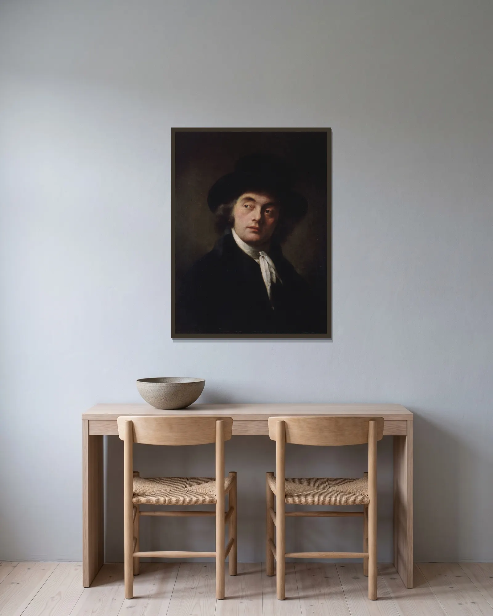 Portrait d’inconnu av Pierre-Paul Prud'hon inramad på en vägg
