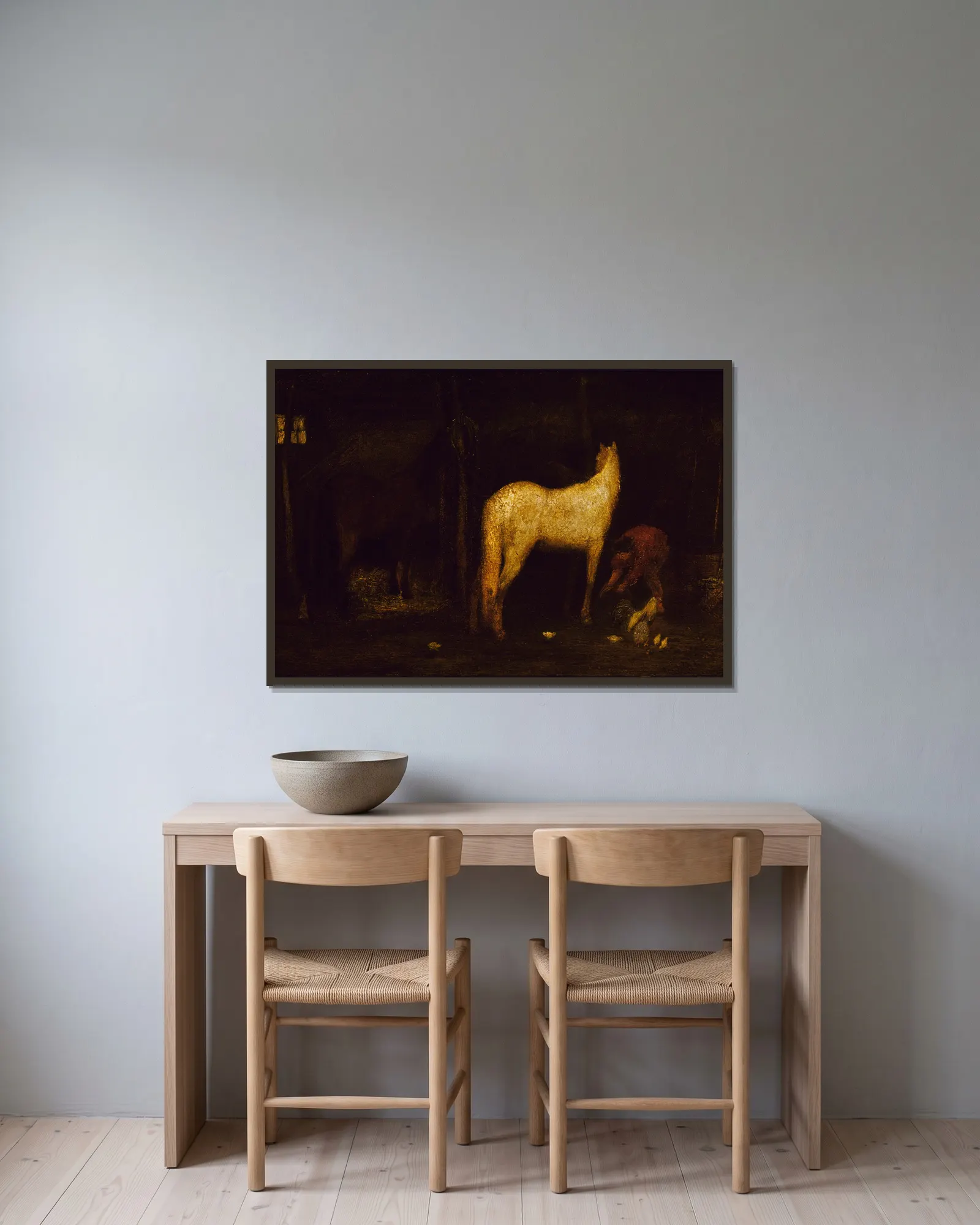 In the Stable av Albert Pinkham Ryder inramad på en vägg