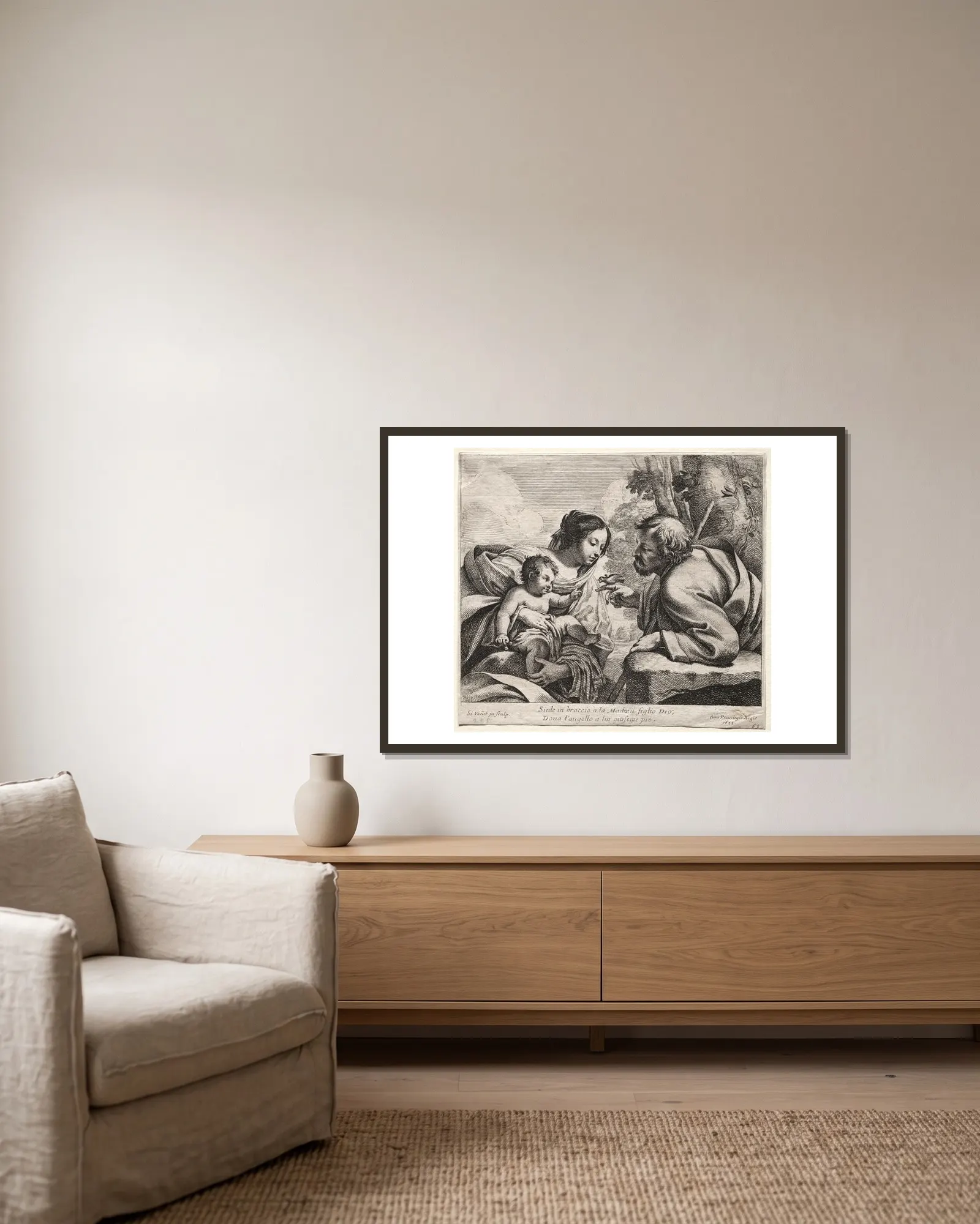 Holy Family av Simon Vouet inramad på en vägg