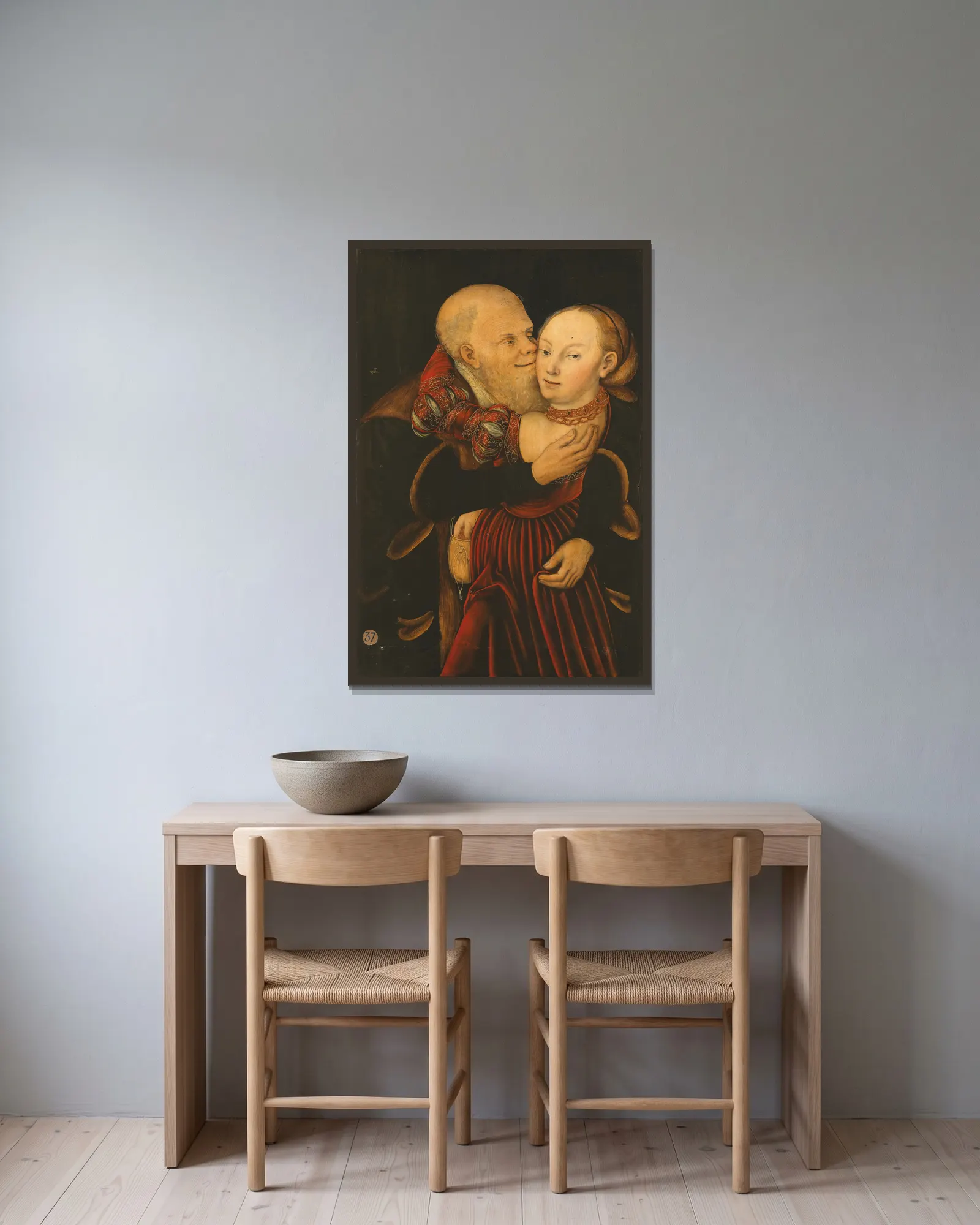 Ill-Matched Lovers av Lucas Cranach the Younger inramad på en vägg