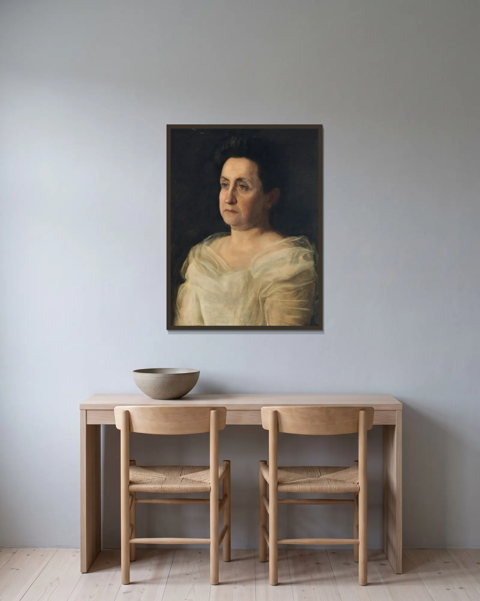 Portrait of Mrs. Matilda Searight av Thomas Eakins inramad på en vägg