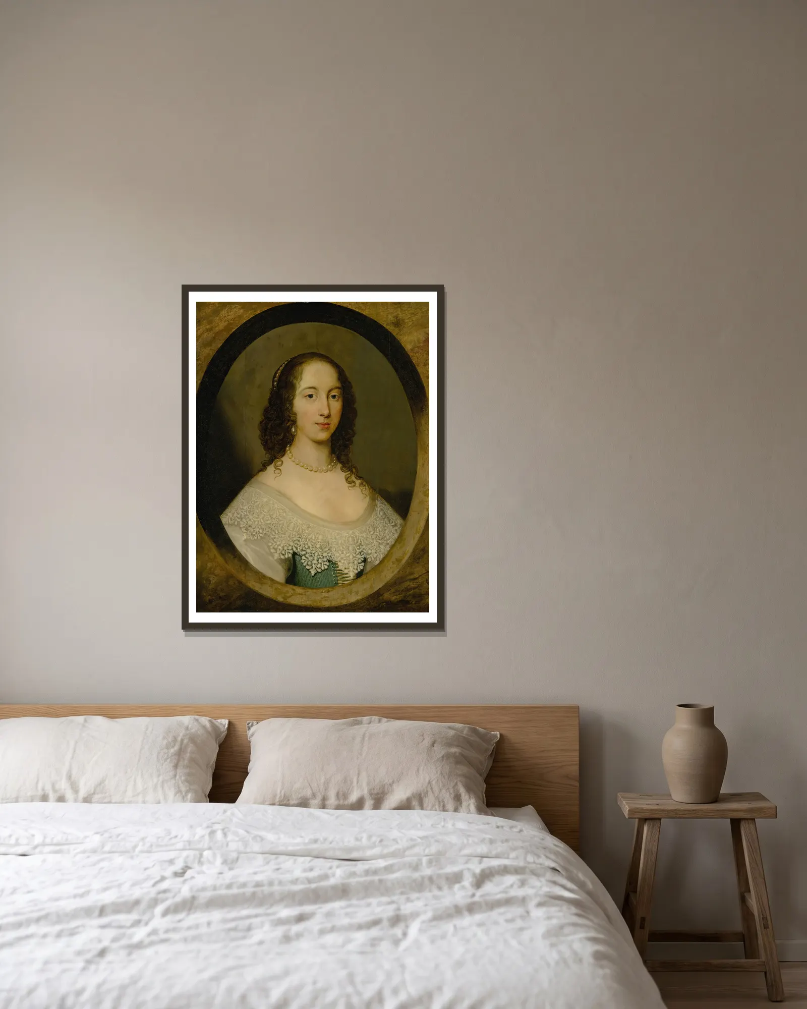Portrait of a lady av Cornelis Jonson van Ceulen inramad på en vägg