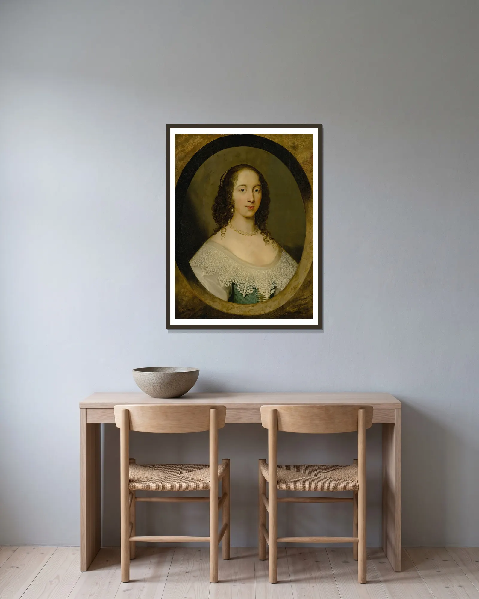 Portrait of a lady av Cornelis Jonson van Ceulen inramad på en vägg