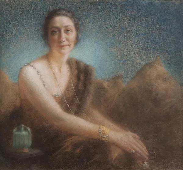 Elegant woman on a sofa av Lucien Lévy-Dhurmer